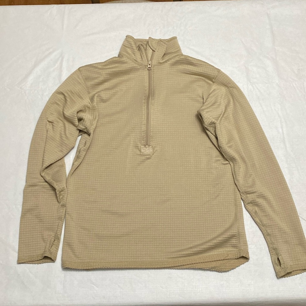 Tan sweater size medium in good condition